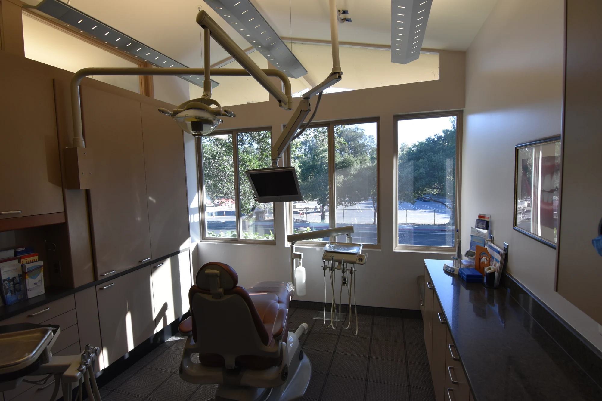 Top Down Dental operatory with a dental chair and windows